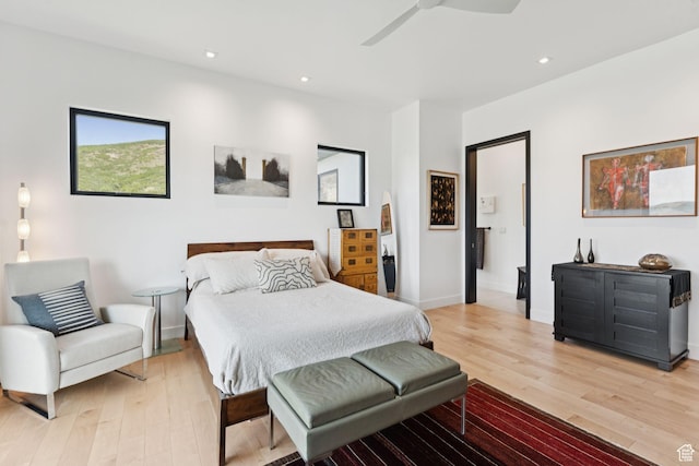 11515 N White Tail Ct, Hideout, UT 84036 - bedroom with light wood-type flooring, recessed lighting, and ceiling fan