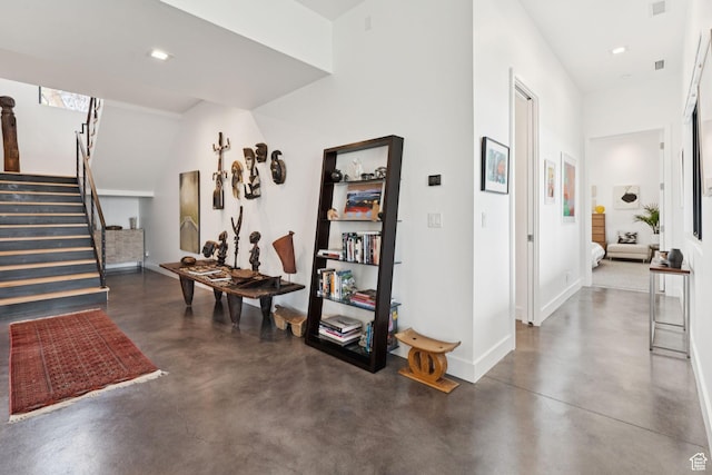 11515 N White Tail Ct, Hideout, UT 84036 - corridor with concrete flooring, stairs, and recessed lighting
