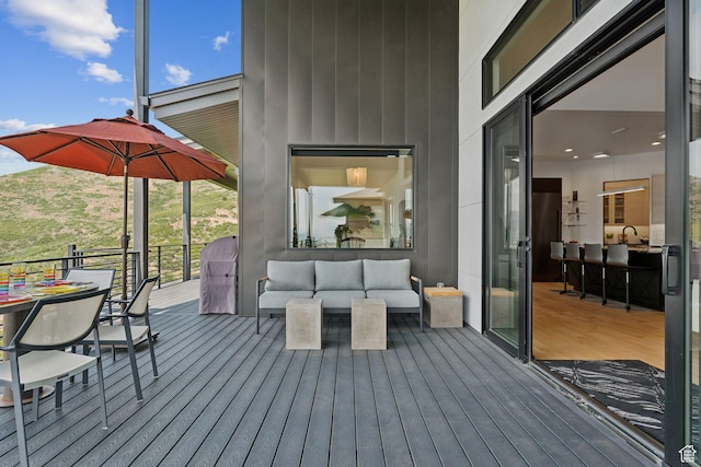 11515 N White Tail Ct, Hideout, UT 84036 - deck with outdoor lounge area and a sink