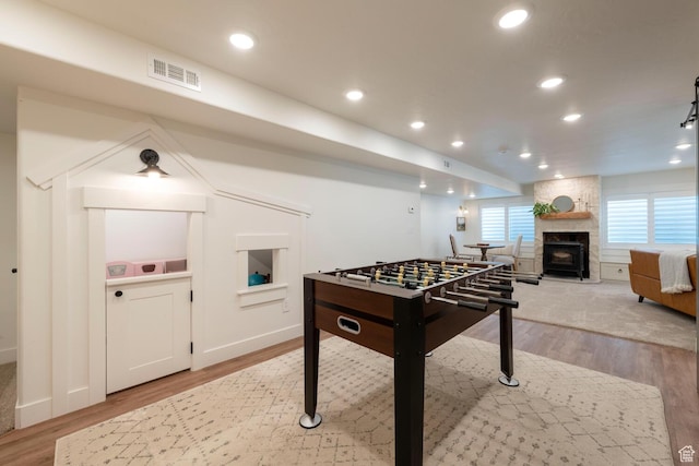 2071 S 500 E, Heber City, UT 84032 - recreation room featuring light wood-style floors, recessed lighting, and a stone fireplace