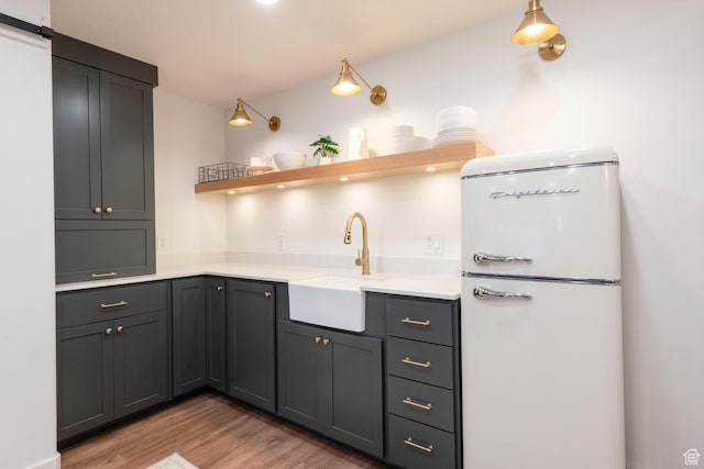 2071 S 500 E, Heber City, UT 84032 - kitchen featuring freestanding refrigerator, open shelves, light wood-style flooring, light countertops, and gray cabinetry