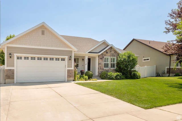 2071 S 500 E, Heber City, UT 84032 - craftsman house featuring stone siding, an attached garage, and concrete driveway