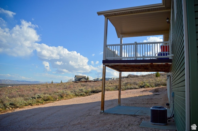 2070 S Sweetwater Parkway Park E Unit 33, Garden City, UT 84028 - view of yard featuring a deck