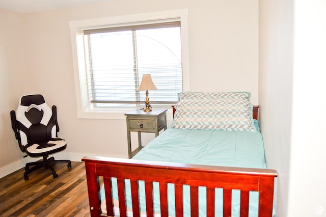 2070 S Sweetwater Parkway Park E Unit 33, Garden City, UT 84028 - bedroom featuring wood finished floors and baseboards