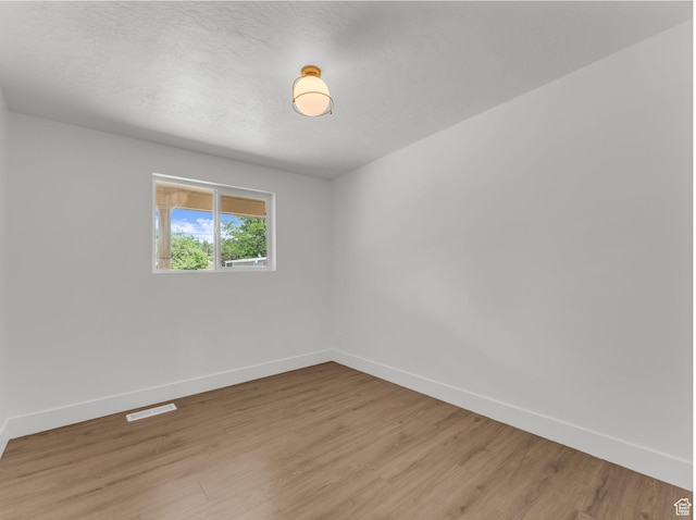 1432 E Colony Dr, Holladay, UT 84117 - spare room with baseboards and light wood-style floors