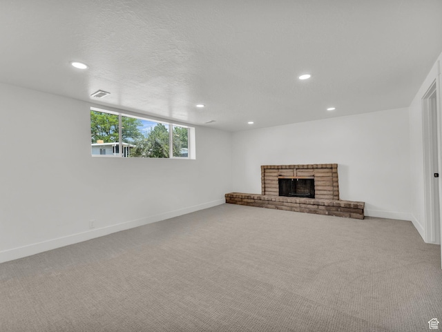 1432 E Colony Dr, Holladay, UT 84117 - unfurnished living room featuring recessed lighting, carpet flooring, and a brick fireplace