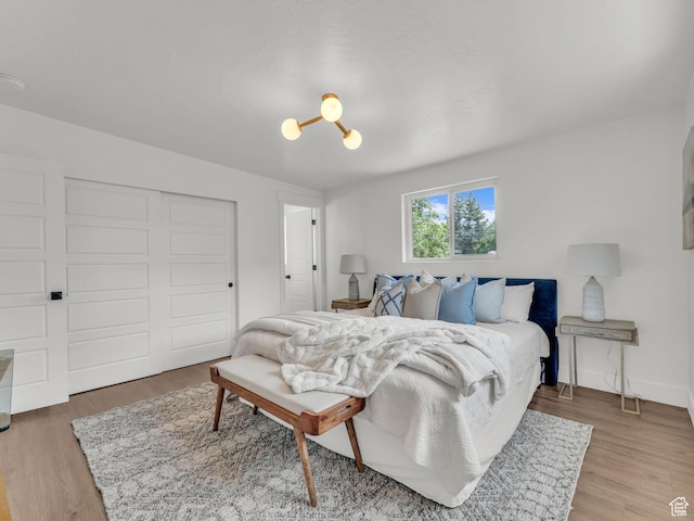 1432 E Colony Dr, Holladay, UT 84117 - bedroom with a closet and wood finished floors