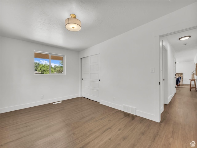 1432 E Colony Dr, Holladay, UT 84117 - spare room featuring wood finished floors