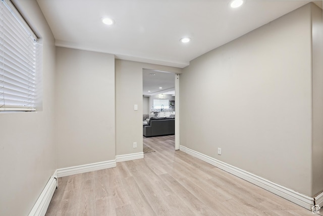 12671 S Somerdowns Ct, Draper, UT 84020 - unfurnished room with light wood-type flooring, recessed lighting, and baseboard heating