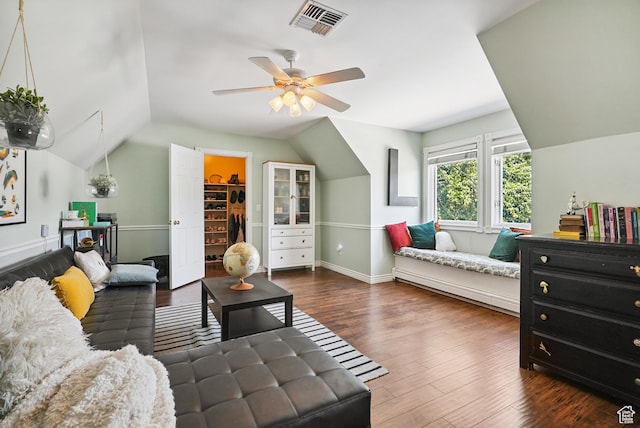 12671 S Somerdowns Ct, Draper, UT 84020 - living area with vaulted ceiling, a ceiling fan, and wood finished floors
