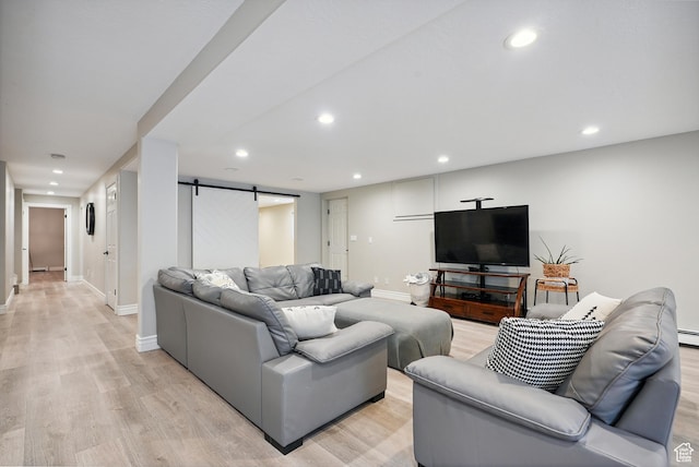 12671 S Somerdowns Ct, Draper, UT 84020 - living room with a barn door, light wood finished floors, and recessed lighting