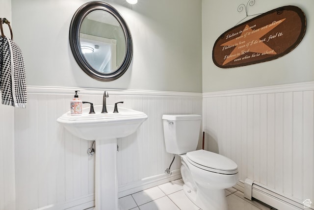 12671 S Somerdowns Ct, Draper, UT 84020 - bathroom with a baseboard heating unit, a wainscoted wall, and tile patterned flooring