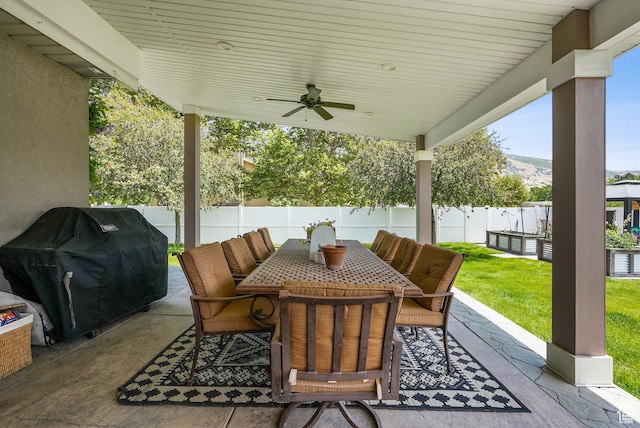 12671 S Somerdowns Ct, Draper, UT 84020 - fenced backyard with outdoor dining area, ceiling fan, area for grilling, and a patio