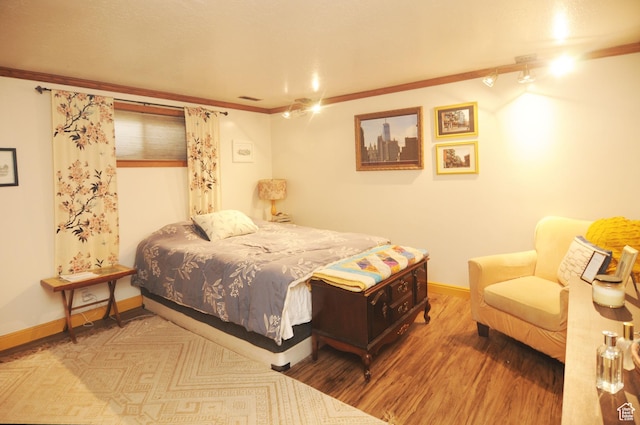 136 E 700 S, Farmington, UT 84025 - bedroom with crown molding and wood finished floors