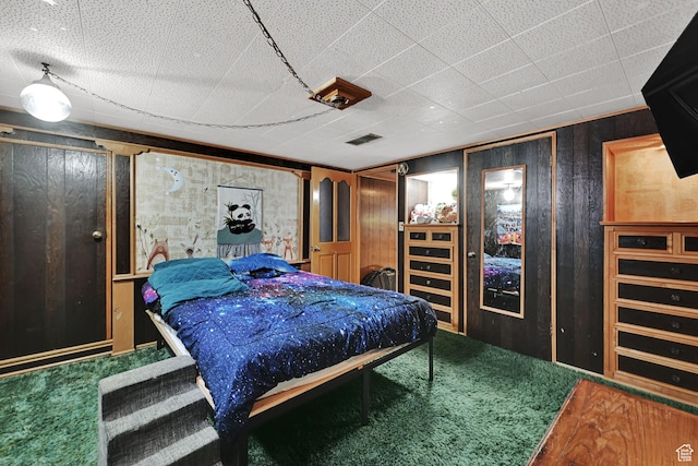 3347 S Rulon St W, Magna, UT 84044 - bedroom featuring carpet flooring and wood walls