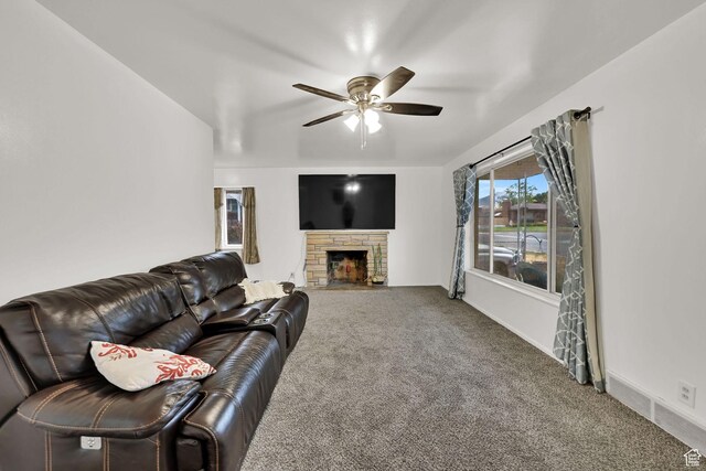 3347 S Rulon St W, Magna, UT 84044 - living area with a ceiling fan, carpet flooring, and a fireplace