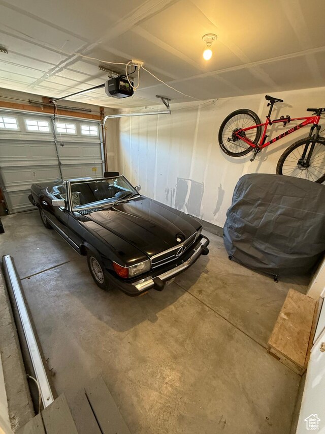 1144 E Trident Dr S, Saratoga Springs, UT 84045 - garage featuring a garage door opener