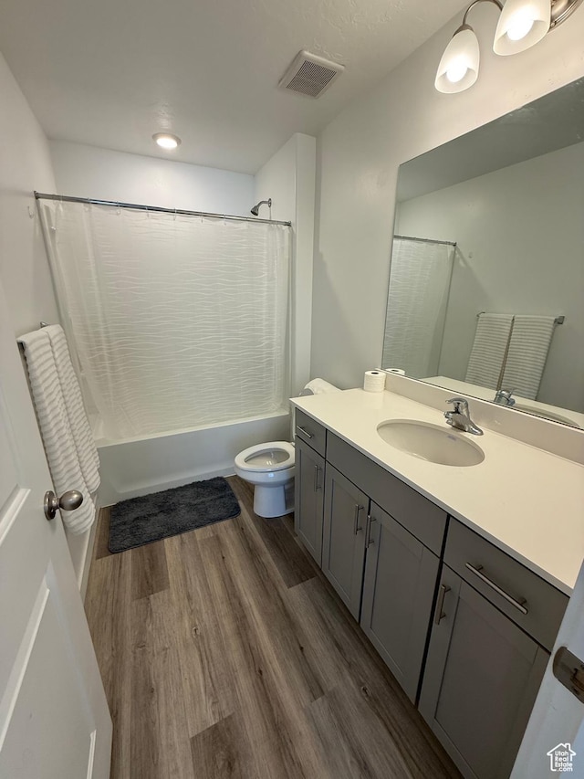1144 E Trident Dr S, Saratoga Springs, UT 84045 - full bathroom with vanity, shower / bath combination with curtain, and wood finished floors