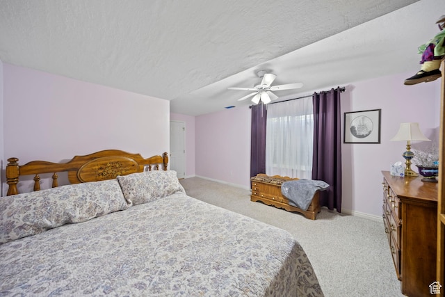5149 W Village Wood Dr, West Valley City, UT 84120 - bedroom featuring light colored carpet, a ceiling fan, and a textured ceiling