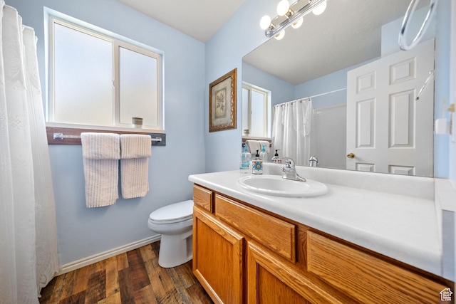5149 W Village Wood Dr, West Valley City, UT 84120 - bathroom with healthy amount of natural light, wood finished floors, and vanity