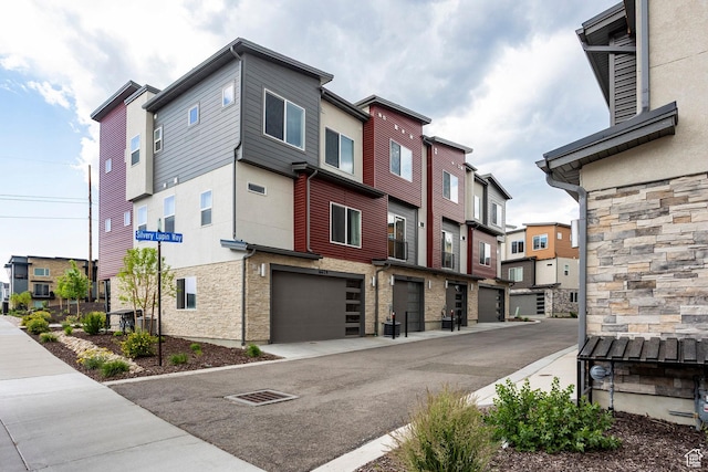 6627 Mountain Alder Way, Park City, UT 84098 - view of building exterior with a residential view and an attached garage