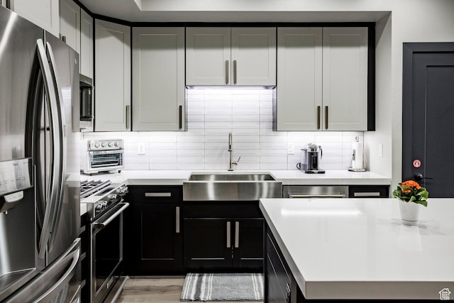 6627 Mountain Alder Way, Park City, UT 84098 - kitchen featuring appliances with stainless steel finishes, light countertops, and tasteful backsplash