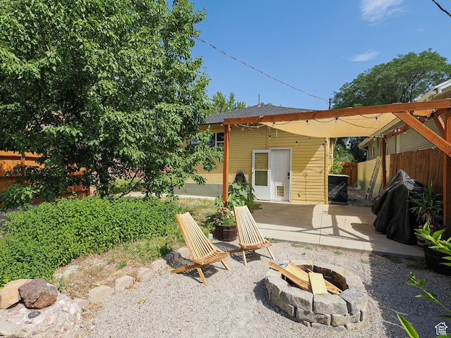320 E Hollywood Ave S, Salt Lake City, UT 84115 - view of patio featuring an outdoor fire pit