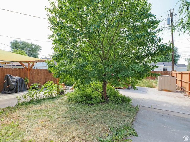 320 E Hollywood Ave S, Salt Lake City, UT 84115 - fenced backyard featuring a patio