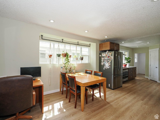 320 E Hollywood Ave S, Salt Lake City, UT 84115 - dining area with light wood-style flooring, a textured ceiling, a desk, and recessed lighting