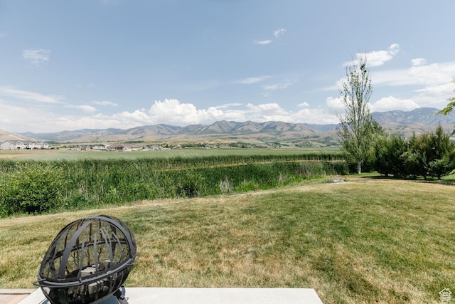 659 S Lakeside Dr, Franklin, ID 83237 - view of green lawn featuring a mountain view and a view of rural / pastoral area