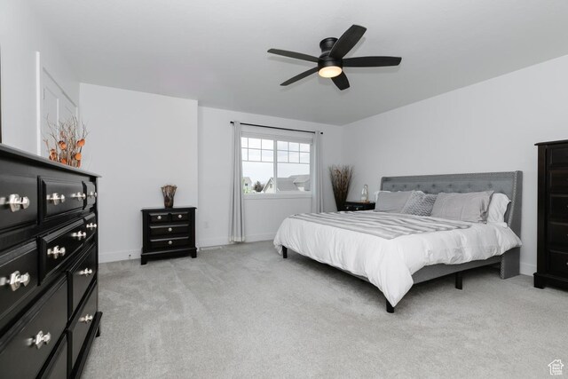 659 S Lakeside Dr, Franklin, ID 83237 - bedroom with light carpet and ceiling fan