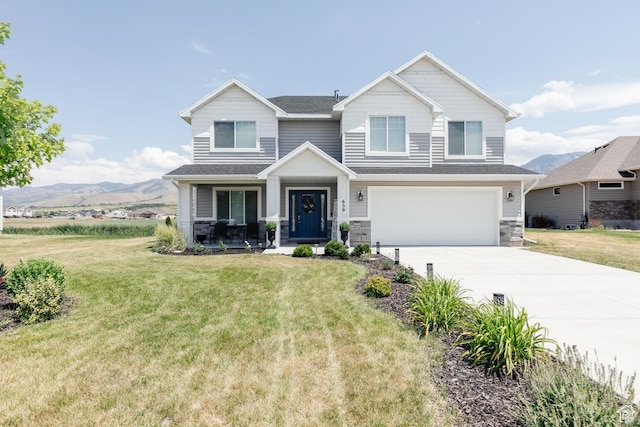 659 S Lakeside Dr, Franklin, ID 83237 - craftsman inspired home with a porch, a garage, driveway, a front lawn, and roof with shingles