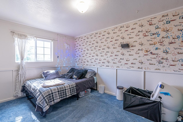 570 N 400 W, Logan, UT 84321 - carpeted bedroom featuring a wainscoted wall, wallpapered walls, and a textured ceiling