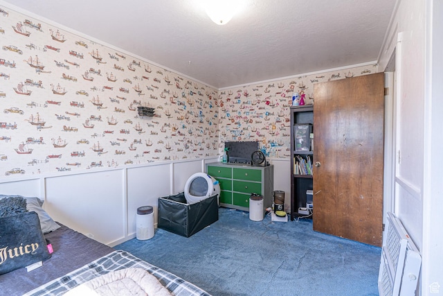 570 N 400 W, Logan, UT 84321 - carpeted bedroom with crown molding, wallpapered walls, and wainscoting
