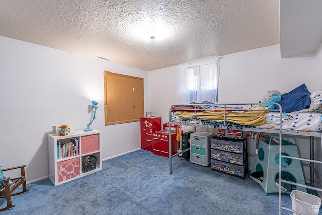 570 N 400 W, Logan, UT 84321 - carpeted bedroom featuring a textured ceiling