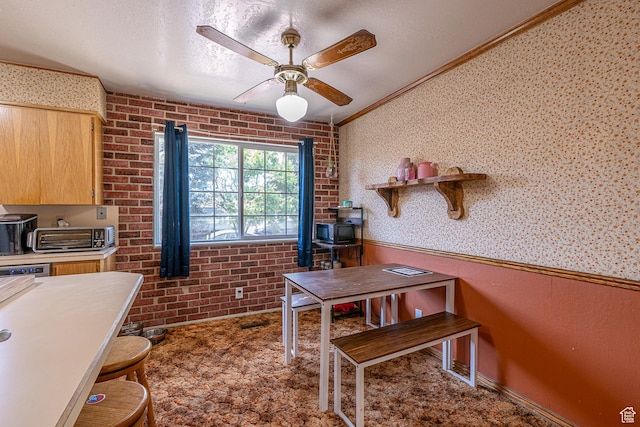 570 N 400 W, Logan, UT 84321 - office area featuring a wood stove, a ceiling fan, ornamental molding, wainscoting, and wallpapered walls