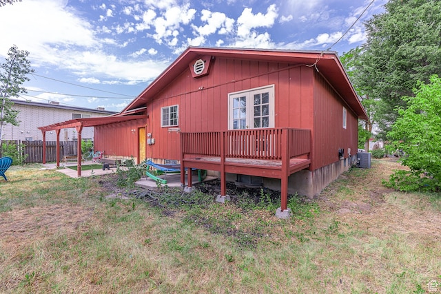 570 N 400 W, Logan, UT 84321 - rear view of house with a patio and a deck