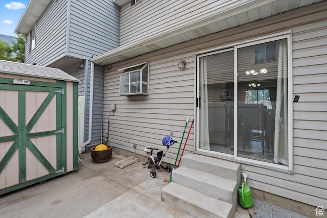 1124 S 1000 E Unit 3, Provo, UT 84606 - view of patio / terrace with entry steps and a storage shed