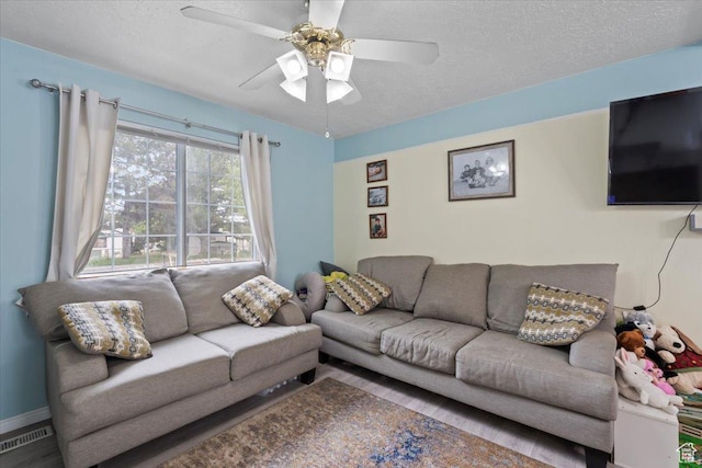 1124 S 1000 E Unit 3, Provo, UT 84606 - living room featuring a textured ceiling and ceiling fan