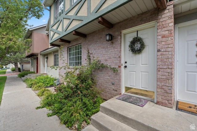 1124 S 1000 E Unit 3, Provo, UT 84606 - doorway to property featuring brick siding