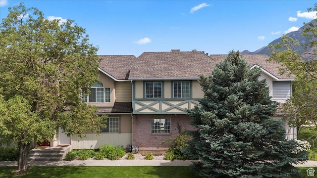 1124 S 1000 E Unit 3, Provo, UT 84606 - view of front of house with roof with shingles and brick siding