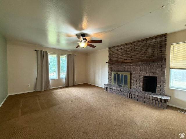159 W 8800 S, Spanish Fork, UT 84660 - unfurnished living room featuring a ceiling fan, carpet flooring, and a fireplace