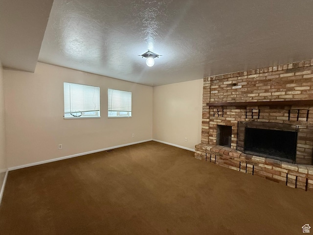 159 W 8800 S, Spanish Fork, UT 84660 - unfurnished living room featuring a brick fireplace, carpet flooring, and a textured ceiling