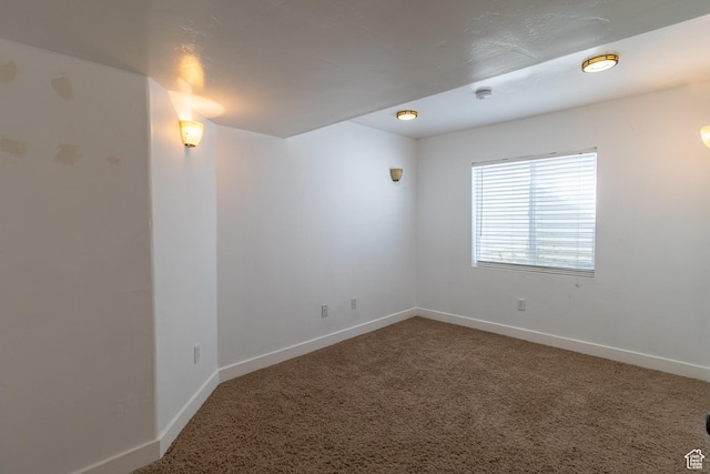4091 W Juniper Hills Dr, South Jordan, UT 84095 - carpeted spare room featuring baseboards and a smoke detector