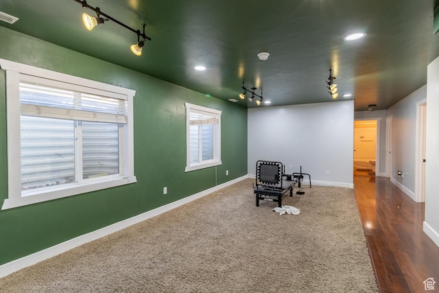 4091 W Juniper Hills Dr, South Jordan, UT 84095 - living area with track lighting, wood finished floors, and recessed lighting