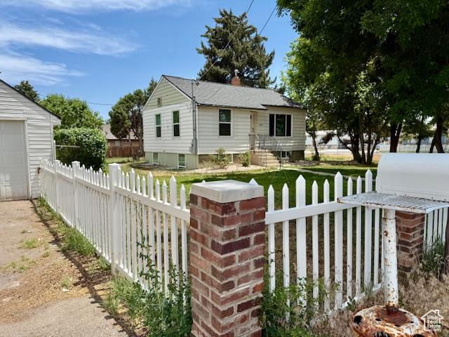 624 N 500 W, Vernal, UT 84078 - view of front of property with a fenced front yard and a garage