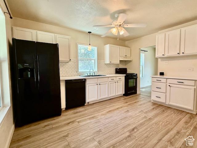 624 N 500 W, Vernal, UT 84078 - kitchen with black appliances, white cabinetry, light countertops, and a ceiling fan