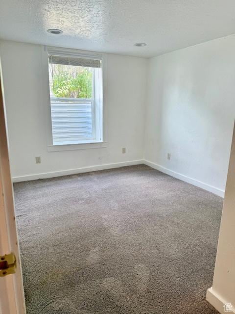 624 N 500 W, Vernal, UT 84078 - unfurnished room with carpet and a textured ceiling