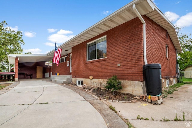 784 Lavina Dr, South Ogden, UT 84403 - view of property exterior with concrete driveway and a carport