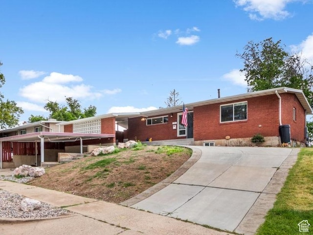 784 Lavina Dr, South Ogden, UT 84403 - ranch-style home with brick siding and driveway